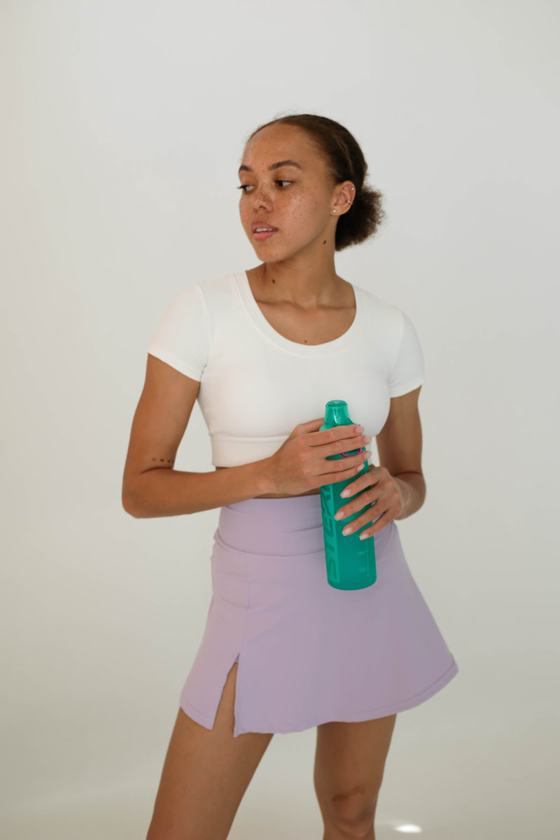 Спортивная  юбка-шорты из эластичной ткани с миниразрезом