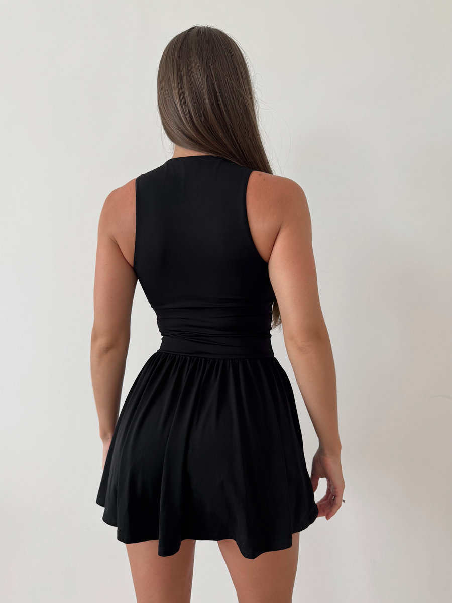 Комбинезон на молнии с юбкой-шортами